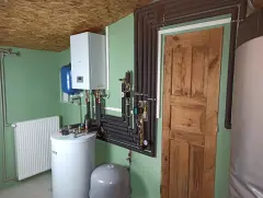 Фото виконаного обв'язування електрокотла, бойлера непрямого нагріву за проєктом